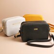 Personalised Rectangular Crossbody Bags in grey black and mustard on top of beige coloured backdrop