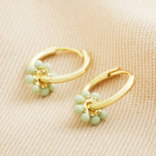 Green Beaded Flower Charm Huggie Hoops in Gold
