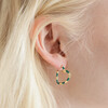 Close Up of Green Enamel Striped Heart Hoop Earrings in Gold on Model