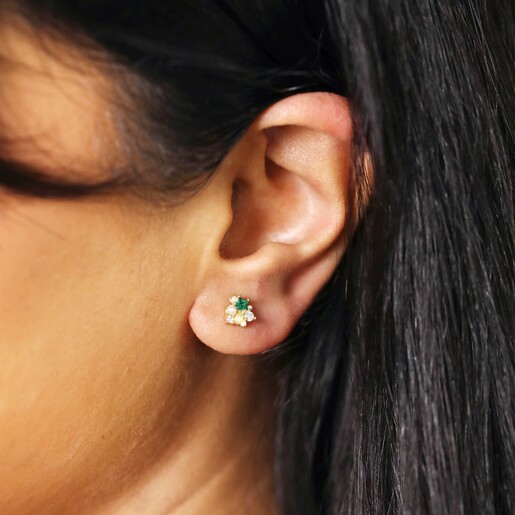 Model Wearing Star Earring from Mismatched Moon and Star Stud Earrings in Gold