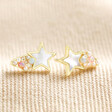 Mother of Pearl Shooting Star Stud Earrings in Gold on top of neutral coloured fabric