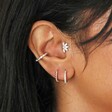 Curated Ear Look on Model Including Titanium Crystal Marquise Fan Helix Earring