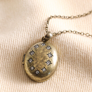 Antiqued Crystal Star Oval Locket Necklace in Gold