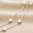 Close up of star charms on Double Chain and Star Charm Necklace in Silver