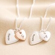 Personalised Textured Double Heart Necklace in Silver with Mixed Metal Version on Beige Fabric