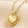 Close up of Pendant on Stainless Steel Tiny Heart Pendant Necklace in Gold