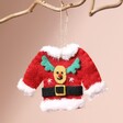 Red Father Christmas Jumper Hanging Decoration hanging from tree branch against natural coloured backdrop