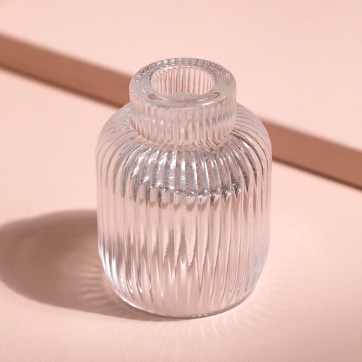 Two in One Medium Fluted Glass Candle Holder against pink backdrop