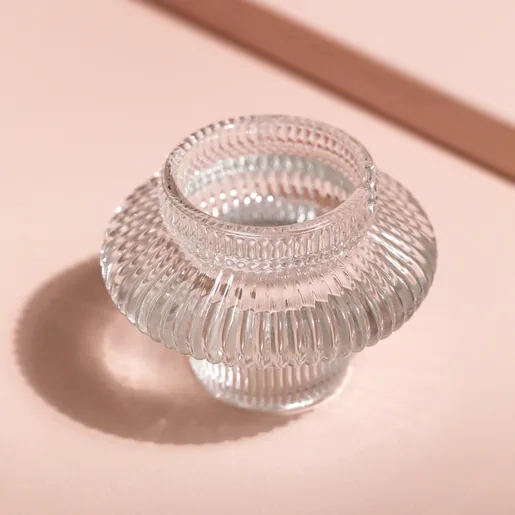 Two in One Small Fluted Glass Candle Holder against neutral coloured background