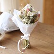 Wildflower Dried Flower Wedding Posy Standing on Wooden Surface 