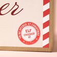 Close Up of Elf Certified Stamp on Personalised North Pole Christmas Gift Box 