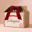 Personalised North Pole Christmas Gift Box on Pink Background