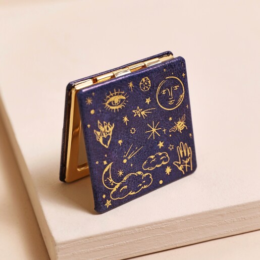Front of Blue Starry Night Compact Mirror on Pink Surface
