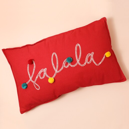 Falala Embroidered Red Pom Pom Cushion on top of neutral coloured background