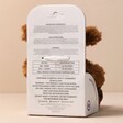 Back of Warmies Junior Highland Cow Soft Toy Packaging