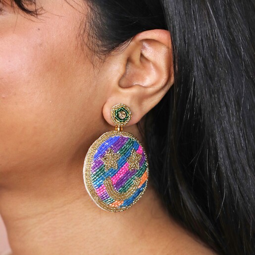 Close up of My Doris Rainbow Smiley Beaded Drop Earrings on model