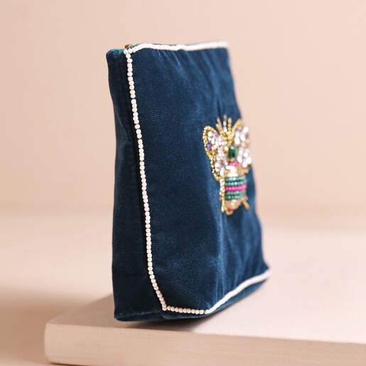 Side of My Doris Jewelled Bee Coin Purse on top of beige coloured backdrop