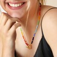 Close Up of Model Wearing My Doris Rainbow Beaded Necklace in Gold