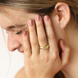 My Doris Adjustable Scattered Crystal Star Ring in Gold on model with hand on face