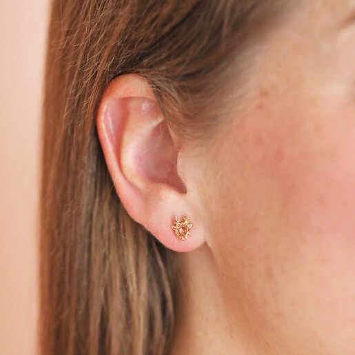 Champagne Festive Crystal Reindeer Stud Earrings in Gold in models' ear