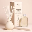 Aery Himalayan Cedarleaf Reed Diffuser on a Beige Background.