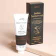 Aery Indian Sandalwood Hand Cream on neutral background