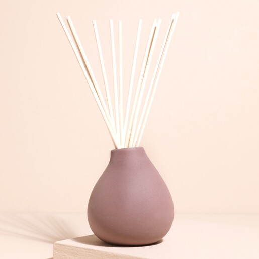 Aery Moroccan Rose Reed Diffuser Aery Moroccan Rose Reed Diffuser on a Beige Background