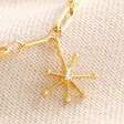 Ball and Star Paperclip Chain Bracelet in Gold Close Up of Star