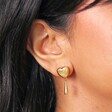 Heart and Teardrop Earrings in Gold Close Up on Model