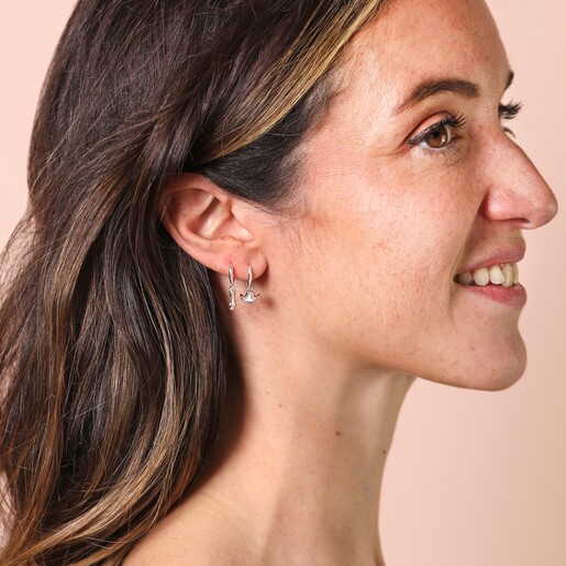 Model Shot Model Shot of Mismatched Cowboy Boot and Hat Huggie Hoop Earrings in Silver
