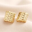 Square Woven Earrings in Gold on Beige Fabric