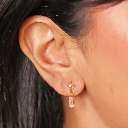Close Up of Earrings on Model Close Up of Star and Crystal Drop Earrings in Gold on Model