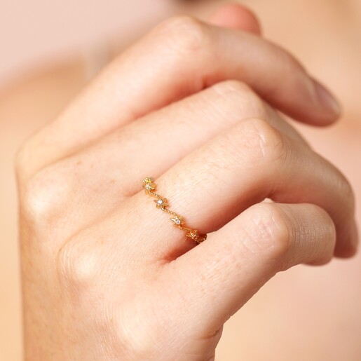Close Up on Model Close Up of Sterling Silver Crystal Star Ring in Gold on Model