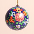 Close Up of Papier Mache Floral Bauble in Blue