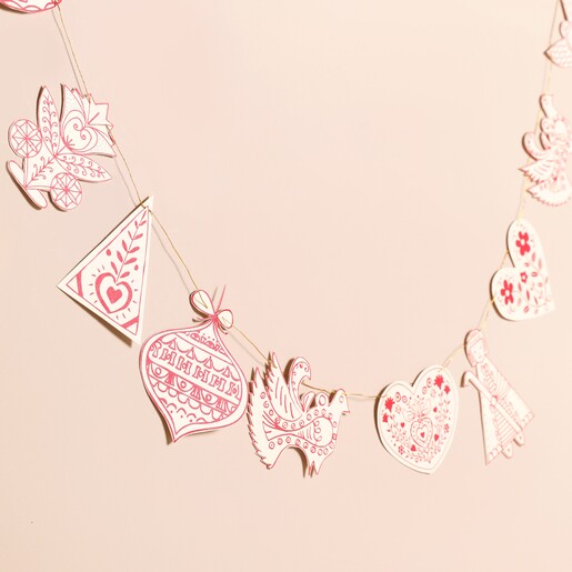 Afroart Swedish Pendants Folklore Garland displayed on a wall