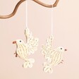 Two quilled hanging doves