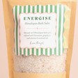 Energise Himalayan Bath Salts with Geranium, Grapefruit and Vitamin E close up of front label with green and white stripes