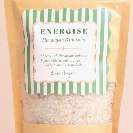 Energise Himalayan Bath Salts with Geranium, Grapefruit and Vitamin E close up of front label with green and white stripes