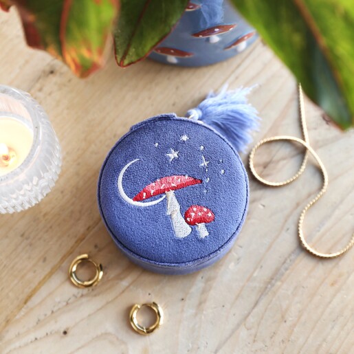 Dusky Blue Velvet Circular Jewellery Case With a Toadstool and Star Embroidered Emblem  Dusky Blue Velvet Circular Jewellery Case With a Toadstool and Star Embroidered Emblem