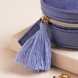 Close Up of Tassel Zip on Moonrise Mini Round Velvet Travel Jewellery Case in Blue