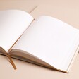 Open blank pages of the personalised wedding guest book 