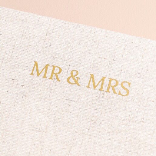 Close up of 'Mr & Mrs' in capital letters and gold foil