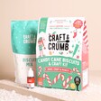 Craft & Crumb Candy Cane Biscuits Bake and Craft Kit on a beige background. 