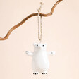 Send With Love Bear Hanging Decoration on a Beige Background