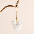 Send with Love Dove Hanging Decoration on a Beige Background