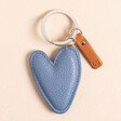 Caroline Gardner Blue Heart Keyring on a Beige Background