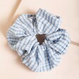 Blue Gingham Hair Scrunchie on Neutral Background