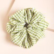 Green Gingham Hair Scrunchie on Neutral Background