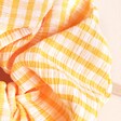 Close Up of Orange Gingham Hair Scrunchie