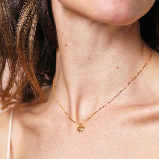 Close Up Model Shot of Estella Bartlett Scallop and Heart Pendant Necklace in Gold